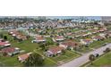 Aerial view showing home's location in a residential neighborhood near the ocean at 133 Cardinal Dr, Ormond Beach, FL 32176
