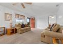 Cozy living room with neutral carpeting and two comfortable sofas at 133 Cardinal Dr, Ormond Beach, FL 32176