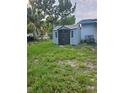 Backyard with storage shed at 401 Cherry St, South Daytona, FL 32119