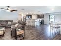 Open concept living room, kitchen, and dining area at 3171 Utah Dr, Deltona, FL 32738