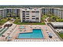 Oceanfront condo complex with pool and lush landscaping at 4175 S Atlantic Ave # 1130, New Smyrna Beach, FL 32169