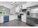 Modern kitchen that features stainless steel appliances and white cabinets at 1790 17Th St, Orange City, FL 32763
