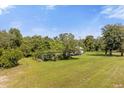 Aerial view of property showing home and expansive land at 3660 Grand Ave, Deland, FL 32720
