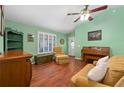 Spacious living room featuring hardwood floors and a neutral color scheme at 3457 Martingale Ct, Port Orange, FL 32129