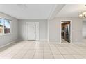 Bright living room with tile floors and an open floor plan at 22 Morning Star Ave, Ormond Beach, FL 32176
