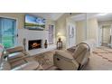 Cozy living room with fireplace and recliners at 980 Bluebird Ter, Deltona, FL 32725