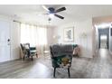 Living room with two armchairs, coffee table, and hardwood floors at 2100 Brian Ave, South Daytona, FL 32119