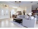 Spacious living room featuring a large seating area and access to other rooms at 1633 Yellow Brick Rd, Astor, FL 32102