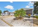 Spacious single-story home with a lush landscaped yard at 121 Moss Dr, Debary, FL 32713