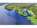 Community marina with numerous boat slips and lush landscaping at 121 Moss Dr, Debary, FL 32713