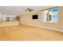 Living room with hardwood floors and an open floor plan at 2947 S Atlantic Ave # 301, Daytona Beach Shores, FL 32118