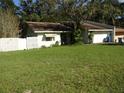 Ranch style home with a fenced yard at 770 Lancaster Rd, Deland, FL 32720