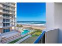 Oceanfront condo with balcony and pool view at 1415 Ocean Shore Blvd # 303, Ormond Beach, FL 32176