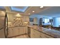 Modern kitchen with granite countertops and stainless steel appliances at 2987 S Atlantic Ave # D060, Daytona Beach, FL 32118
