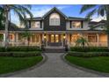 Elegant home exterior with a grand entrance at 4 Broad Creek Cir, Ormond Beach, FL 32174