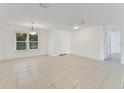 Spacious dining room featuring tile floors and lots of natural light at 660 Saxon Blvd, Deltona, FL 32725
