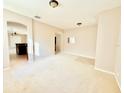 Bright and spacious living room with neutral carpeting at 211 Foxglove Way, Deland, FL 32724