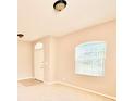 Bright living room with neutral walls and carpet at 211 Foxglove Way, Deland, FL 32724