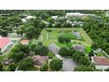 Aerial view of houses and a residential neighborhood at 966 Springs Landing Dr, Deltona, FL 32725