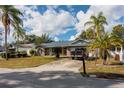 Brick house with attached garage and landscaping at 1020 Hanford Dr, Deltona, FL 32738