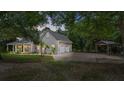 House exterior with a large yard and covered patio at 5711 John Anderson Hwy, Flagler Beach, FL 32136