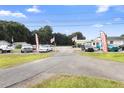 Aerial view of commercial property and surrounding area at 2490 N Woodland Blvd, Deland, FL 32720