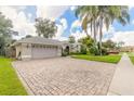 One story house with driveway and landscaping at 6225 Cranberry Dr, Port Orange, FL 32127