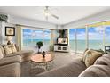 Living room with ocean views and comfortable seating at 1900 N Atlantic Ave # 1601, Daytona Beach, FL 32118
