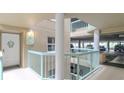 Building interior hallway with access to parking and units at 4 Oceans West Blvd # 301C, Daytona Beach Shores, FL 32118