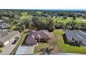 Home view with a golf course in the background at 1185 N Old Mill Dr, Deltona, FL 32725