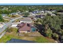 House with pool and large backyard, community view at 1185 N Old Mill Dr, Deltona, FL 32725