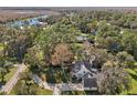 House nestled in a wooded area, offering a tranquil setting at 2236 River Ridge Rd, Deland, FL 32720