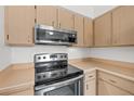 Stainless steel stove and microwave in the kitchen at 503 Phoenix Ave, Daytona Beach, FL 32118