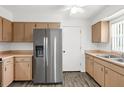 Kitchen features stainless steel appliances and wood cabinets at 503 Phoenix Ave, Daytona Beach, FL 32118