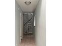 Spiral staircase connecting the floors of the home at 101 N Hill S Ave # 7, Deland, FL 32724