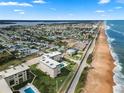 Aerial view of condo building and surrounding area at 2294 Ocean Shore Blvd # 401, Ormond Beach, FL 32176