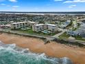 Aerial view of beachfront condos and community at 2294 Ocean Shore Blvd # 401, Ormond Beach, FL 32176