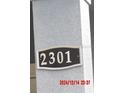House number 2301 displayed on a plaque at 2301 9Th Ave, Deland, FL 32724
