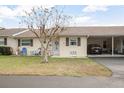 Front view of single story house with carport at 230 Elmwood Ave # 460, Deland, FL 32724