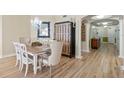Elegant dining room featuring a wood table and chandelier at 2300 N Atlantic Ave # 1701, Daytona Beach, FL 32118