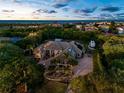 Large home on spacious lot with ocean views at sunset at 3765 John Anderson Dr, Ormond Beach, FL 32176