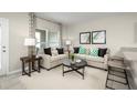 Light and airy living room with neutral decor and a comfy couch at 2310 Incandescent Way, South Daytona, FL 32119