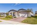 Curb appeal abounds in this charming one-story home at 2312 Crossbow St, Clermont, FL 34715