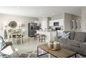 Modern kitchen with island, stainless steel appliances, and granite countertops at 1657 Laia Rd, Haines City, FL 33844