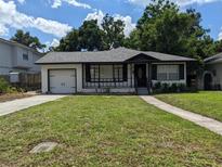 Charming bungalow with a newly paved driveway at 2721 Woodland Hills Ave, Lakeland, FL 33803