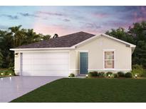 One-story home with a two-car garage and landscaped lawn at 2117 Kansas Rd, Sumterville, FL 33585