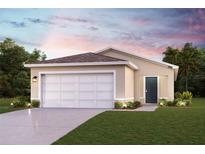 Single-story home with a two-car garage and landscaped lawn at 1258 Chester Ave, Haines City, FL 33844