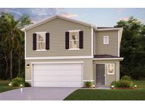 Two-story home with a two-car garage, front yard landscaping, and a covered entryway at 2362 Aquiline Nest St, Eagle Lake, FL 33839