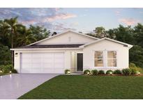 Exterior of a single-story house with a garage at 5060 Sw 155Th Loop, Ocala, FL 34473