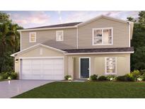 Two-story house with a two-car garage and landscaping at 1405 Stuart Ln, Poinciana, FL 34759